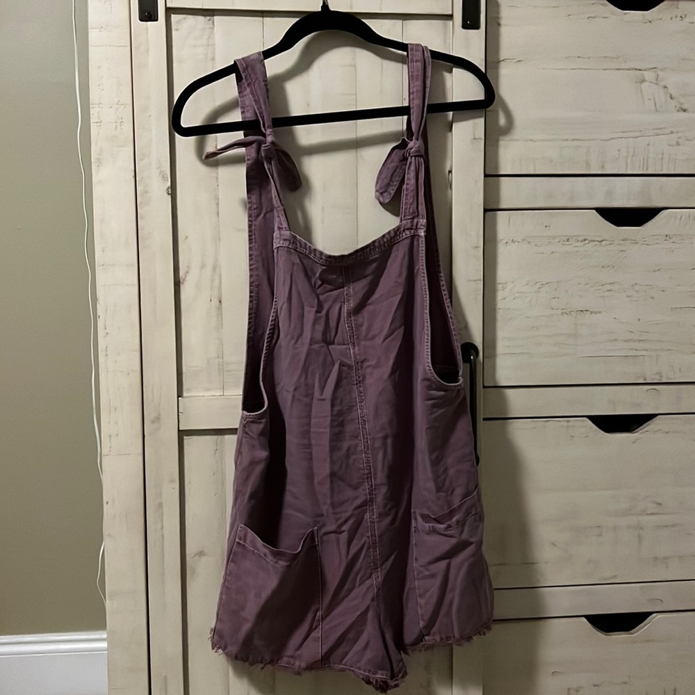 Purple overalls